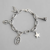 Bracelet vintage en argent sterling 925 avec ailes d'étoile croisée et bouclier de la Tour Eiffel